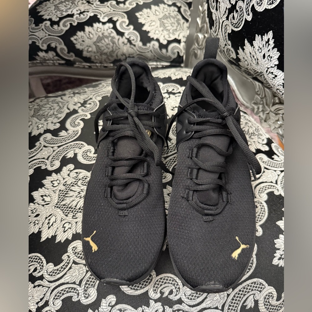 Puma Black Sneakers with Gold Accents